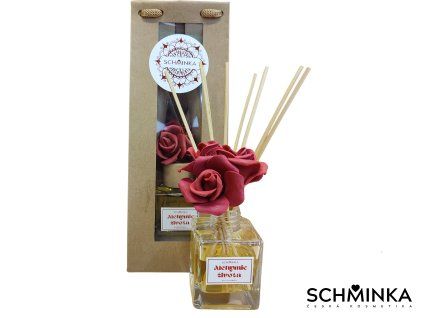Skleněný aroma difuzér s černými tyčinkami a dekorativní červenou růží