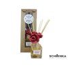 Skleněný aroma difuzér s černými tyčinkami a dekorativní červenou růží